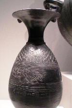 Bucchero black vase with animals