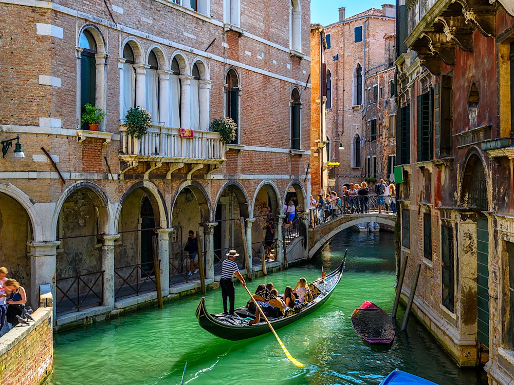 Venice-Italy-canal-with-gondola-swiper-hero-gallery