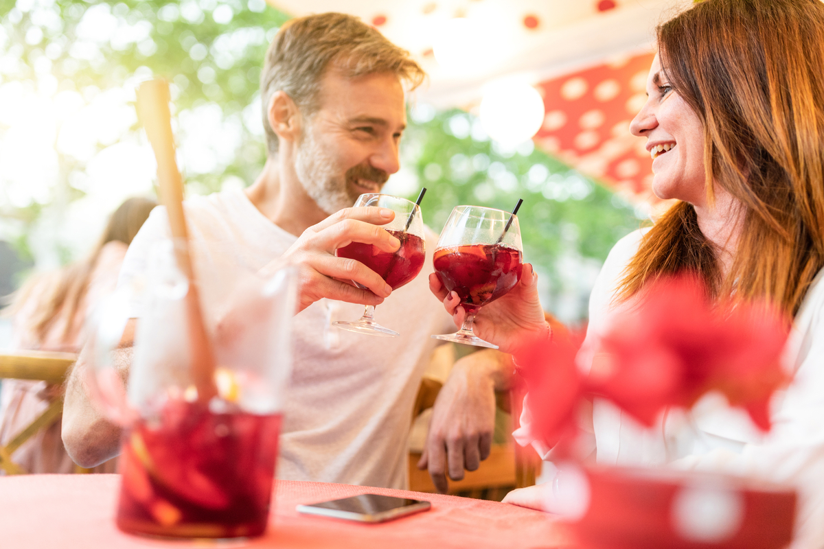 Couple enjoys sangria cocktails in Spain