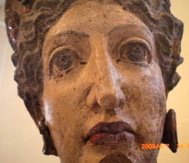 Woman's head of painted terracotta, Villa Giulia, Rome